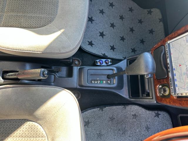 ミラジーノ ミニライトスペシャル　ナルディステアリング　Ｌ８８０Ｋコペン足回り　Ｌ８８０ＫコペンＦブレーキ　ナビ　キーレスエントリー　ＡＴ　アルミホイール　衝突安全ボディ　エアコン　パワーステアリング　パワーウィンドウ（5枚目）