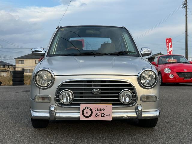 ミラジーノ ミニライトスペシャル　ナルディステアリング　Ｌ８８０Ｋコペン足回り　Ｌ８８０ＫコペンＦブレーキ　ナビ　キーレスエントリー　ＡＴ　アルミホイール　衝突安全ボディ　エアコン　パワーステアリング　パワーウィンドウ（11枚目）