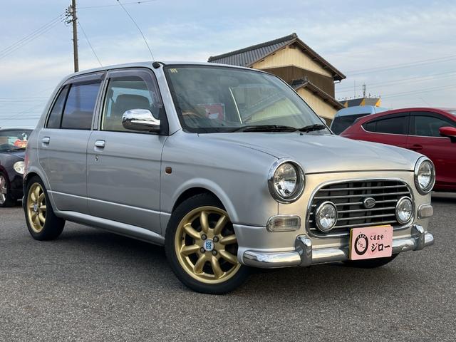 ミラジーノ ミニライトスペシャル　ナルディステアリング　Ｌ８８０Ｋコペン足回り　Ｌ８８０ＫコペンＦブレーキ　ナビ　キーレスエントリー　ＡＴ　アルミホイール　衝突安全ボディ　エアコン　パワーステアリング　パワーウィンドウ（12枚目）