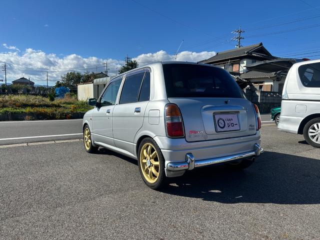 ミラジーノ ミニライトスペシャル　ナルディステアリング　Ｌ８８０Ｋコペン足回り　Ｌ８８０ＫコペンＦブレーキ　ナビ　キーレスエントリー　ＡＴ　アルミホイール　衝突安全ボディ　エアコン　パワーステアリング　パワーウィンドウ（16枚目）