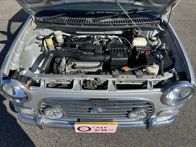 ミラジーノ ミニライトスペシャル　ナルディステアリング　Ｌ８８０Ｋコペン足回り　Ｌ８８０ＫコペンＦブレーキ　ナビ　キーレスエントリー　ＡＴ　アルミホイール　衝突安全ボディ　エアコン　パワーステアリング　パワーウィンドウ（18枚目）