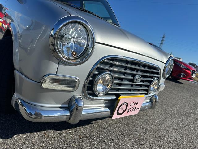 ミラジーノ ミニライトスペシャル　ナルディステアリング　Ｌ８８０Ｋコペン足回り　Ｌ８８０ＫコペンＦブレーキ　ナビ　キーレスエントリー　ＡＴ　アルミホイール　衝突安全ボディ　エアコン　パワーステアリング　パワーウィンドウ（20枚目）