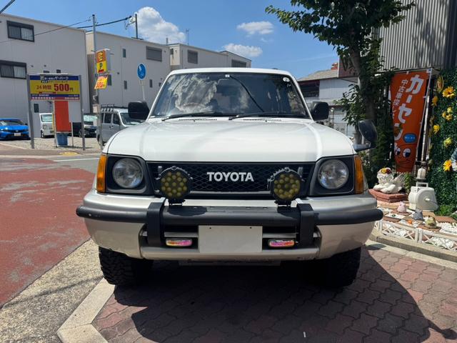ランドクルーザープラド ＴＸ　ＮＯＸ－ＰＭ適合／丸目変換／ターボタイマー／ＥＴＣ／茶シートカバー／ディーゼル適合車／証明書付／Ｔベルト交換履歴有（36枚目）
