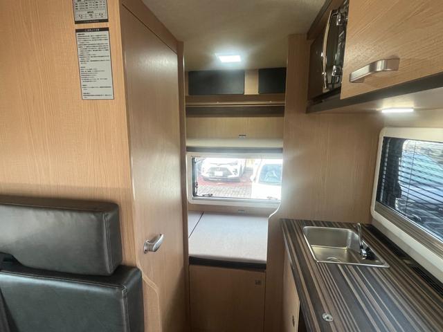 カムロード ＶＡＮＴＥＣＨ　コルドバンクス　ソーラーパネル付　家庭用エアコン　サブバッテリー×３　外部電源　冷蔵庫　電子レンジ　６人乗り　４ＷＤディーゼル　Ｗタイヤ　寒冷地仕様　換気扇　走行充電　ナビ　バックカメラ　ＦＦヒーター（37枚目）