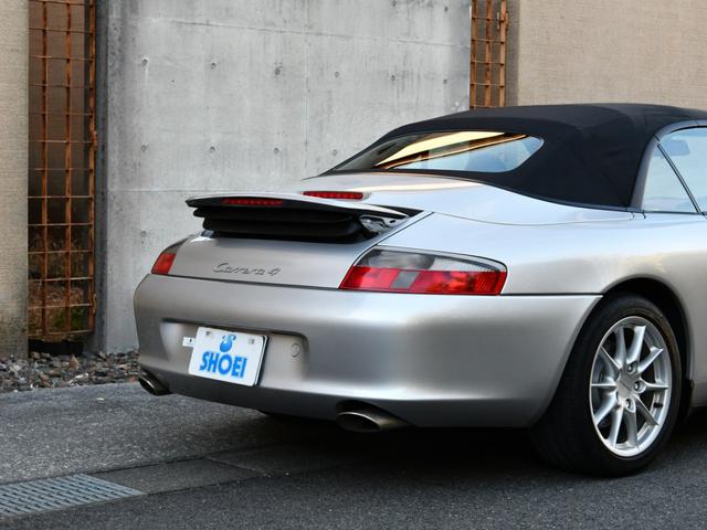 ９１１ ９１１カレラ４　カブリオレ　ミギＨテラコッタＳＰカラーインテリア４ＷＤハードトップシートヒーターシルバーブレーキキャリパー　カレラ４ホイールキャップリトロニックライトナビゲーションポルシェセンター整備記録簿ウインドディフレクター（19枚目）