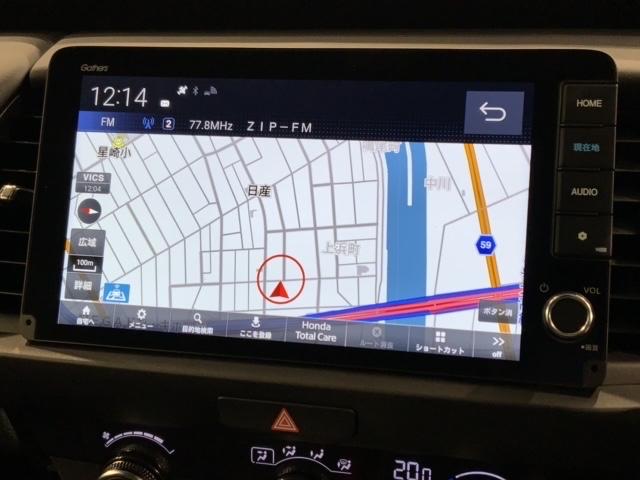 フィット e:HEVホーム HSENSING新車保証試乗車ワンオ-ナ- 前後誤発進抑制機能 助手席エアバッグ 運転席エアバッグ 1オナ 禁煙 LEDライト USB接続 バックカメラ ABS サイドエアバッグ フルセグTV 記録簿(6枚目)