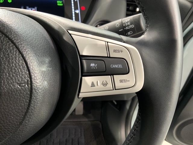 フィット e:HEVホーム HSENSING新車保証試乗車ワンオ-ナ- 前後誤発進抑制機能 助手席エアバッグ 運転席エアバッグ 1オナ 禁煙 LEDライト USB接続 バックカメラ ABS サイドエアバッグ フルセグTV 記録簿(12枚目)