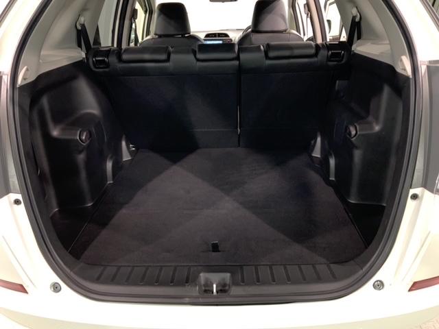 フィットシャトルハイブリッド ハイブリッド・ナビプレミアムセレクション　１年保証　純正ナビ　ＴＶ　Ｒカメラ　ＣＤ録音　音楽機器接続　ＤＶＤ　ＥＴＣ　ＨＩＤ　アルミ　スマ－トキ－　盗難防止装置　整備記録簿　ＡＡＣ　ドアバイザ－　Ｗエアバッグ　ＵＳＢ　Ｂカメラ　ＨＤＤナビ（34枚目）