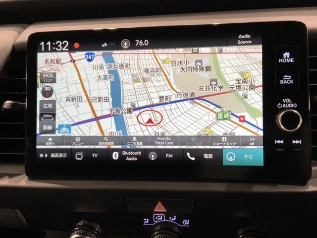 フィット ｅ：ＨＥＶＲＳ　ペット臭有り　Ｈ　ＳＥＮＳＩＮＧ　最長５年保証　純正ナビ　ＴＶ　Ｒカメラ　ＥＴＣ　ＬＥＤライト　ＶＳＡ　アルミ　スマ－トキ－　スペアキ－　盗難防止装置　整備記録簿　ドアバイザ－　ＡＡＣ　Ｗエアバッグ（6枚目）