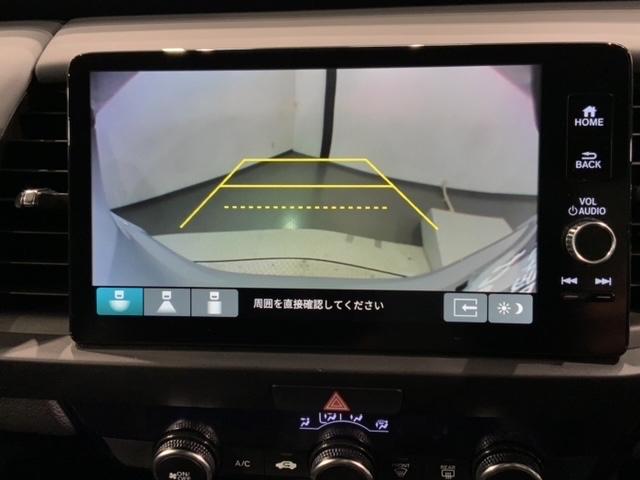 フィット ｅ：ＨＥＶＲＳ　ペット臭有り　Ｈ　ＳＥＮＳＩＮＧ　最長５年保証　純正ナビ　ＴＶ　Ｒカメラ　ＥＴＣ　ＬＥＤライト　ＶＳＡ　アルミ　スマ－トキ－　スペアキ－　盗難防止装置　整備記録簿　ドアバイザ－　ＡＡＣ　Ｗエアバッグ（7枚目）