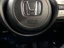 e:HEVホーム HSENSING新車保証試乗車ワンオ-ナ- 前後誤発進抑制機能 助手席エアバッグ 運転席エアバッグ 1オナ 禁煙 LEDライト USB接続 バックカメラ ABS サイドエアバッグ フルセグTV 記録簿(22枚目)