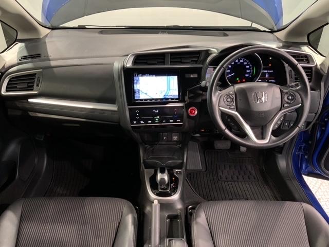 フィットハイブリッド Ｌホンダセンシング　最長５年保証　ワンオーナー　ナビＶＸＭ－１８７ＶＦＥｉ　ＴＶ　Ｒカメラ　ＣＤ録音　ＢＴオ－ディオ　ＤＶＤ　ＥＴＣ　ＬＥＤライト　ＶＳＡ　クルコン　フォグ　スマートキー　盗難防止装置　整備記録簿　ＡＡＣ（8枚目）