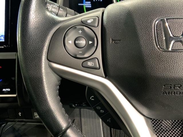 フィットハイブリッド Ｌホンダセンシング　最長５年保証　ワンオーナー　ナビＶＸＭ－１８７ＶＦＥｉ　ＴＶ　Ｒカメラ　ＣＤ録音　ＢＴオ－ディオ　ＤＶＤ　ＥＴＣ　ＬＥＤライト　ＶＳＡ　クルコン　フォグ　スマートキー　盗難防止装置　整備記録簿　ＡＡＣ（9枚目）