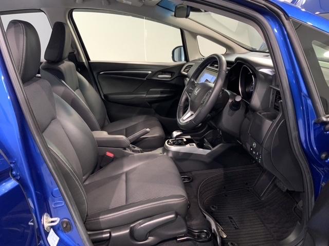 フィットハイブリッド Ｌホンダセンシング　最長５年保証　ワンオーナー　ナビＶＸＭ－１８７ＶＦＥｉ　ＴＶ　Ｒカメラ　ＣＤ録音　ＢＴオ－ディオ　ＤＶＤ　ＥＴＣ　ＬＥＤライト　ＶＳＡ　クルコン　フォグ　スマートキー　盗難防止装置　整備記録簿　ＡＡＣ（16枚目）