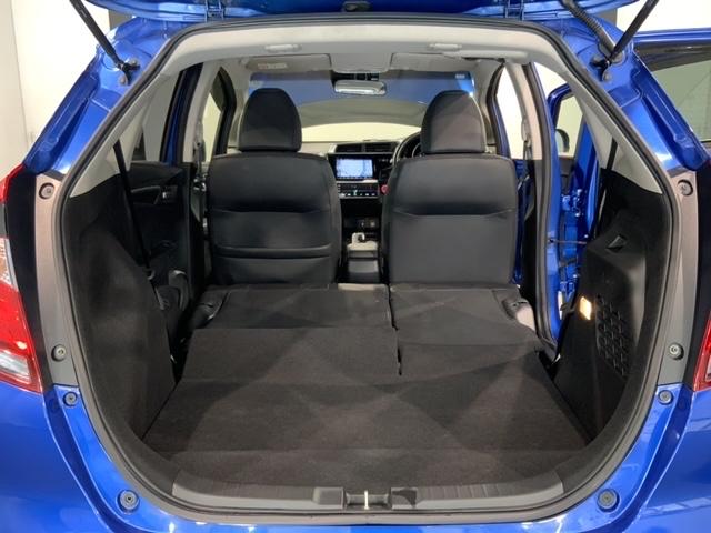 フィットハイブリッド Ｌホンダセンシング　最長５年保証　ワンオーナー　ナビＶＸＭ－１８７ＶＦＥｉ　ＴＶ　Ｒカメラ　ＣＤ録音　ＢＴオ－ディオ　ＤＶＤ　ＥＴＣ　ＬＥＤライト　ＶＳＡ　クルコン　フォグ　スマートキー　盗難防止装置　整備記録簿　ＡＡＣ（18枚目）