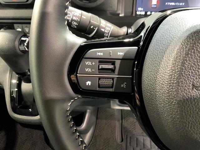 N-BOXカスタム コーディネートスタイル H SENSING 2ト-ン 新車保証 試乗車 ワンオーナー ナビLXU-242NBi TV Rカメラ CD録音 BTオ-ディオ DVD シートヒーター ETC LEDライト VSA 両側電動ドア(10枚目)