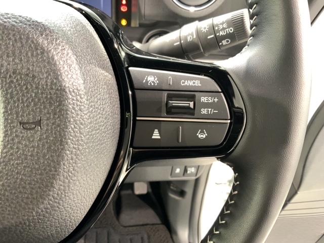 N-BOXカスタム コーディネートスタイル H SENSING 2ト-ン 新車保証 試乗車 ワンオーナー ナビLXU-242NBi TV Rカメラ CD録音 BTオ-ディオ DVD シートヒーター ETC LEDライト VSA 両側電動ドア(11枚目)