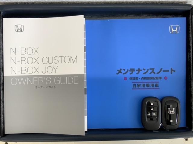 N-BOXカスタム コーディネートスタイル H SENSING 2ト-ン 新車保証 試乗車 ワンオーナー ナビLXU-242NBi TV Rカメラ CD録音 BTオ-ディオ DVD シートヒーター ETC LEDライト VSA 両側電動ドア(16枚目)