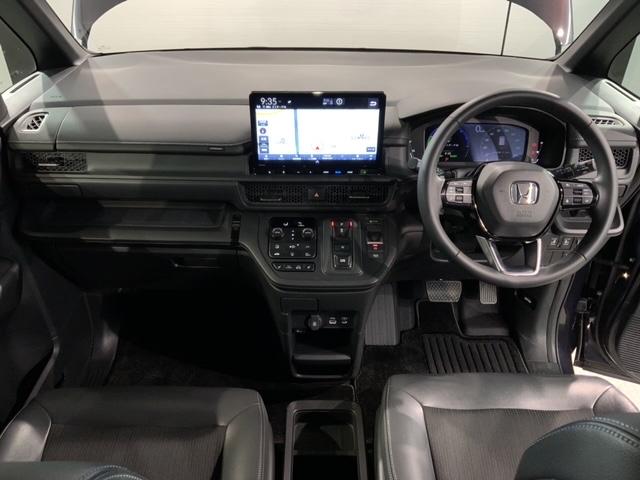 ステップワゴン ｅ：ＨＥＶスパーダ　Ｈ　ＳＥＮＳＩＮＧ　最長５年保証　ワンオ－ナ－　ナビＬＸＭ－２３７ＶＦＬｉ　ＴＶ　Ｒカメラ　ＣＤ録音　ＢＴオ－ディオ　ＤＶＤ　Ｒモニタ－　ＥＴＣ　ＬＥＤライト　両側電動ドア　ＶＳＡ　シ－トヒ－タ－（9枚目）