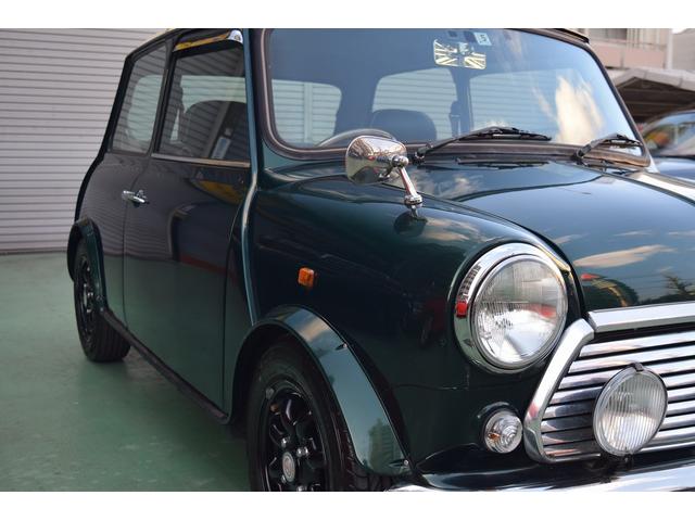 ＭＩＮＩ クーパー　正規Ｄ車　右Ｈ　４速ＭＴ　純正ＡＷ　ユニオンジャックルーフ　黒革シート（19枚目）