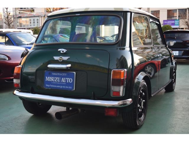 ＭＩＮＩ クーパー　正規Ｄ車　右Ｈ　４速ＭＴ　純正ＡＷ　ユニオンジャックルーフ　黒革シート（25枚目）