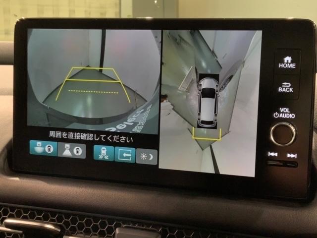 ｅ：ＨＥＶ　Ｚ　ホンダセンシング　新車保証　禁煙試乗車　ナビ　マルチビュカメラ　ＢＴオーディオ　ＴＶ　アルミ　ＬＥＤヘッド　シートヒーター　パワーシート　クルコン　障害物センサー　パワーテールゲート　ＥＴＣ(6枚目)