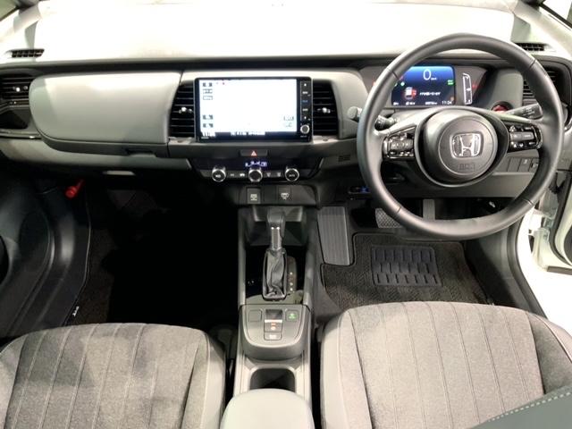 フィット e:HEVホームブラックスタイル H SENSING 新車保証 試乗車 ワンオ-ナ- ナビVXU-245FTi TV Rカメラ CD録音 BTオ-ディオ DVD ETC LEDライト VSA クルコン アルミ スマ-トキ- スペアキ-(9枚目)
