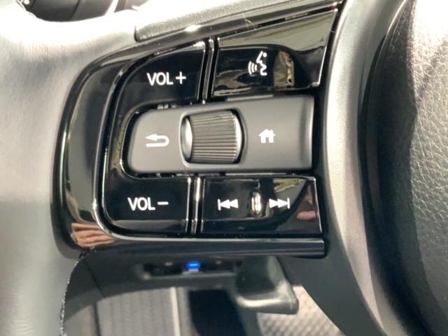 フィット e:HEVホームブラックスタイル H SENSING 新車保証 試乗車 ワンオ-ナ- ナビVXU-245FTi TV Rカメラ CD録音 BTオ-ディオ DVD ETC LEDライト VSA クルコン アルミ スマ-トキ- スペアキ-(10枚目)
