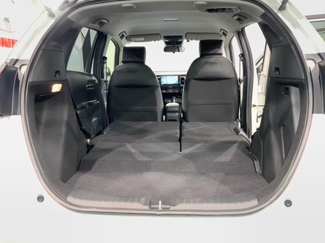 フィット e:HEVホームブラックスタイル H SENSING 新車保証 試乗車 ワンオ-ナ- ナビVXU-245FTi TV Rカメラ CD録音 BTオ-ディオ DVD ETC LEDライト VSA クルコン アルミ スマ-トキ- スペアキ-(19枚目)