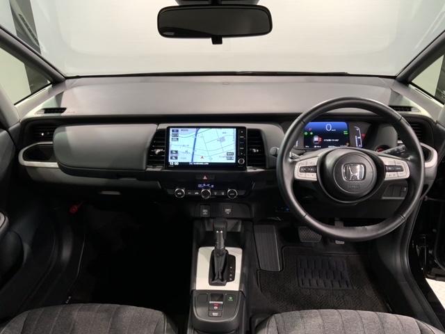 フィット e:HEVホーム ホンダセンシング 新車保証継承 禁煙 当社デモカー ナビ Rカメラ CD DVD BTオーディオ TV サイド+カーテンエアバック LEDヘッド クルコン 障害物センサー スマートキー ETC(9枚目)