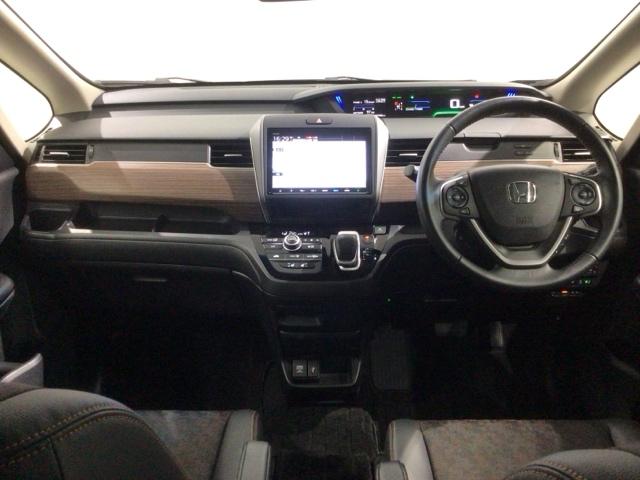 フリード+ハイブリッド ハイブリッド・クロスターホンダセンシング 最長5年保証 ナビ Rカメラ CD DVD BTオーディオ 音楽録音 TV サイド+カーテンエアバック アルミ LEDヘッド フォグ シートヒーター スマートキー ドラレコ ワンオーナー 両側電動ドア(8枚目)