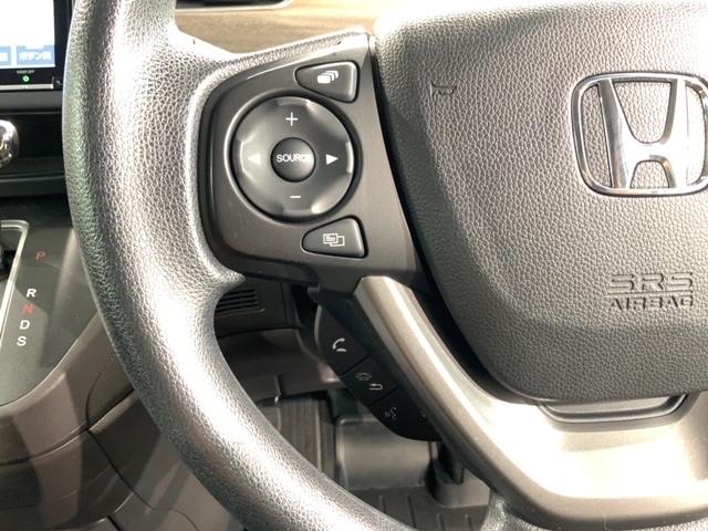 フリード Ｇ・ホンダセンシング　最長５年保証　ナビ　Ｒ席モニター　Ｒカメラ　ＣＤ　ＤＶＤ　ＢＴオーディオ　音楽録音　ＴＶ　ＬＥＤヘッド　シートヒ－タ－　クルコン　ドラレコ　ワンオーナー　禁煙　両側電動スライドドア　スマートキー（11枚目）