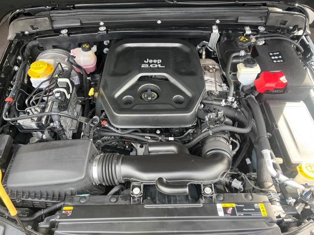 ジープ・ラングラーアンリミテッド サハラ　１オーナー　禁煙車　黒革シート　アダプティブクルコン　ブラインドスポットアシスト　純正ナビ　カープレイ　バックカメラ　シートヒーター　ＡＬＰＩＮＥオーディオシステム　スマートキー　Ｂｌｕｅｔｏｏｔｈ（19枚目）