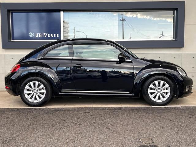 ザ・ビートル デザイン　レザーシートパッケージ　７１４ＳＤＣＷパッケージ　ＨＩＤヘッドライト　黒革シート　シートヒーター　クルコン　バックカメラ　スマートキー　Ｂｌｕｅｔｏｏｔｈ　禁煙車　オートライト　純正１６インチＡＷ（19枚目）