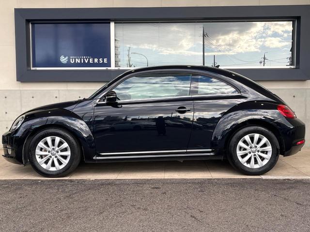 ザ・ビートル デザイン　レザーシートパッケージ　７１４ＳＤＣＷパッケージ　ＨＩＤヘッドライト　黒革シート　シートヒーター　クルコン　バックカメラ　スマートキー　Ｂｌｕｅｔｏｏｔｈ　禁煙車　オートライト　純正１６インチＡＷ（44枚目）