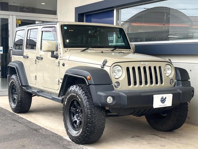 ジープ・ラングラーアンリミテッド スポーツ ポータブルナビ ワンセグ 純正オーディオ CD再生 クルーズコントロール キーレス ETC 18インチアルミホイール オートエアコン 禁煙車(22枚目)