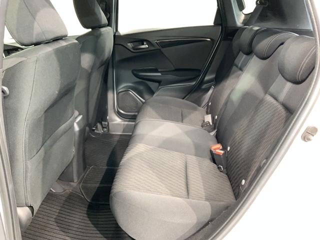 フィットハイブリッド S ホンダセンシング 最長5年保証 ワンオーナー ナビVXM-194VFi TV Rカメラ BTオ-ディオ DVD ETC LEDライト VSA クルコン アルミ フォグ ドアバイザー スマートキー 盗難防止装置 AAC(32枚目)