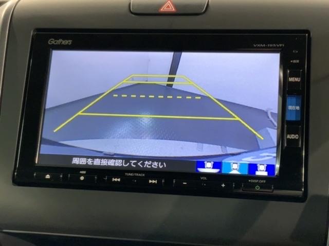 フリード Ｇ・ホンダセンシング　最長５年保証　ワンオーナー　ナビＶＸＭ－１９５ＶＦｉ　ＴＶ　Ｒカメラ　ＣＤ録音　ＢＴオ－ディオ　ＤＶＤ　ＥＴＣ　ＶＳＡ　両側電動ドア　クルコン　スマートキー　盗難防止装置　整備記録簿　ＡＡＣ（7枚目）