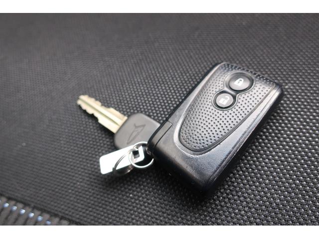 ムーヴ カスタム　Ｘ　ワンオーナー　ディスチャージヘッド　フォグ　プッシュスタート　社外アルミ　純正アルミ＋スタッドレスタイヤセット　オートエアコン　全車検点検整備記録簿　リアルーフスポイラー　純正マット＆ドアバイザー（28枚目）