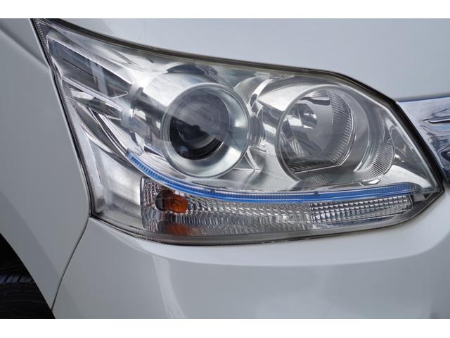 ムーヴ カスタム　Ｘ　ワンオーナー　ディスチャージヘッド　フォグ　プッシュスタート　社外アルミ　純正アルミ＋スタッドレスタイヤセット　オートエアコン　全車検点検整備記録簿　リアルーフスポイラー　純正マット＆ドアバイザー（50枚目）