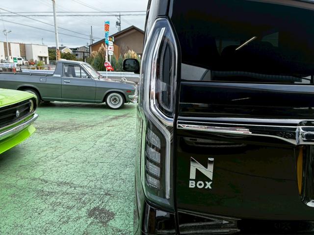 N-BOXカスタム G・Lターボホンダセンシング ターボ ナビTV BTオーディオ 禁煙車 両側電動スライド バックカメラ スマートキー2個 ETC パドルシフト マットバイザー リアスポ USB 新車取説保証書(13枚目)