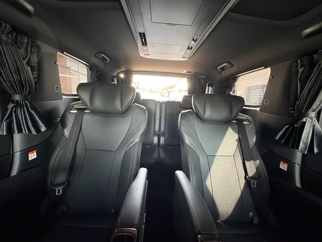 ヴェルファイアハイブリッド Z プレミア モデリスタエアロ&ガーニッシュ ユニバーサルステップ14インチリアシートエンターテイメントJBL15スピーカー 寒冷地 ITSコネクト ガラスコート エグゼクティブマット 遮光カーテン Rベッドキット(12枚目)