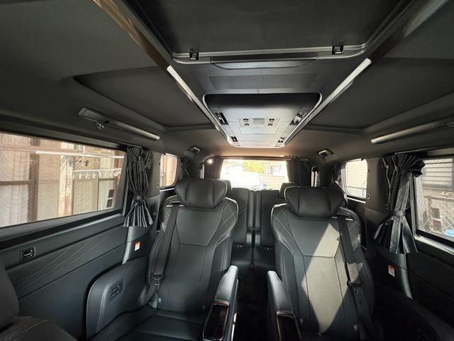 ヴェルファイアハイブリッド Z プレミア モデリスタエアロ&ガーニッシュ ユニバーサルステップ14インチリアシートエンターテイメントJBL15スピーカー 寒冷地 ITSコネクト ガラスコート エグゼクティブマット 遮光カーテン Rベッドキット(13枚目)