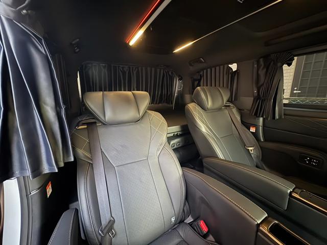 ヴェルファイアハイブリッド Z プレミア モデリスタエアロ&ガーニッシュ ユニバーサルステップ14インチリアシートエンターテイメントJBL15スピーカー 寒冷地 ITSコネクト ガラスコート エグゼクティブマット 遮光カーテン Rベッドキット(18枚目)