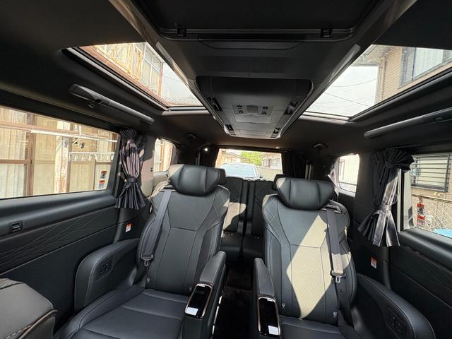 ヴェルファイアハイブリッド Z プレミア モデリスタエアロ&ガーニッシュ ユニバーサルステップ14インチリアシートエンターテイメントJBL15スピーカー 寒冷地 ITSコネクト ガラスコート エグゼクティブマット 遮光カーテン Rベッドキット(20枚目)