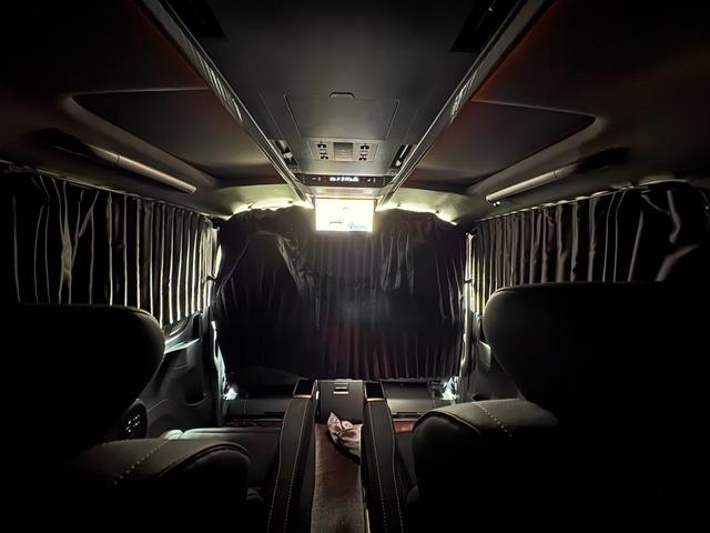 ヴェルファイアハイブリッド Z プレミア モデリスタエアロ&ガーニッシュ ユニバーサルステップ14インチリアシートエンターテイメントJBL15スピーカー 寒冷地 ITSコネクト ガラスコート エグゼクティブマット 遮光カーテン Rベッドキット(23枚目)