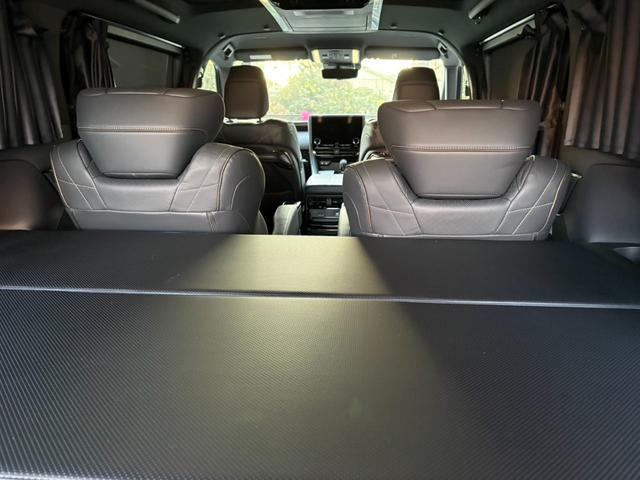 ヴェルファイアハイブリッド Z プレミア モデリスタエアロ&ガーニッシュ ユニバーサルステップ14インチリアシートエンターテイメントJBL15スピーカー 寒冷地 ITSコネクト ガラスコート エグゼクティブマット 遮光カーテン Rベッドキット(55枚目)