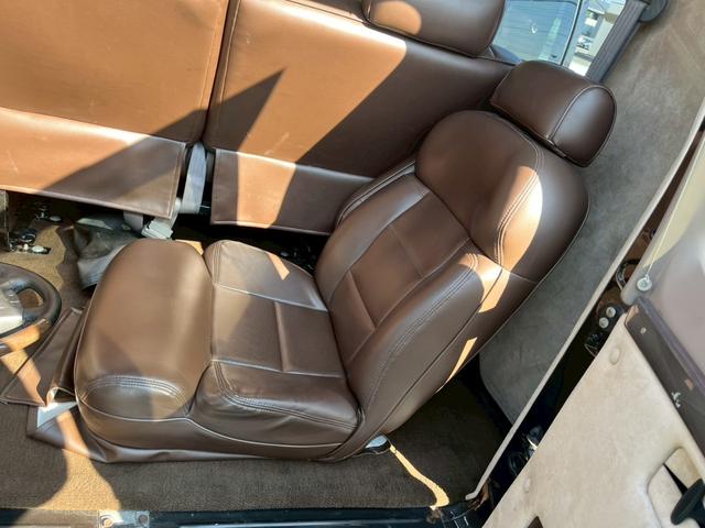 ダッジ・ラム B1500リージェンシー コンバージョン 2003年最終モデル 車高調ローダウン ワンオフサイドマフラー シート張替え D席レカロ ノーマルシート&ハンドル車内 ダッジ専用ワタナベアルミ 防錆コート(49枚目)