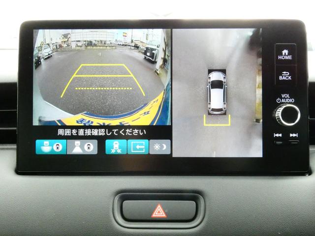 ヴェゼル ｅ：ＨＥＶ　Ｚ　登録済未使用車　９型ナビ　３６０°カメラ　ＥＴＣ２．０　後退出庫サポート　ＣＭＢＳ　ＡＣＣ　ＢＳＩ　アダプティブドライビングビーム　ＬＫＡＳ　ステアリングヒーター　ハンズフリーパワーバックドア（5枚目）