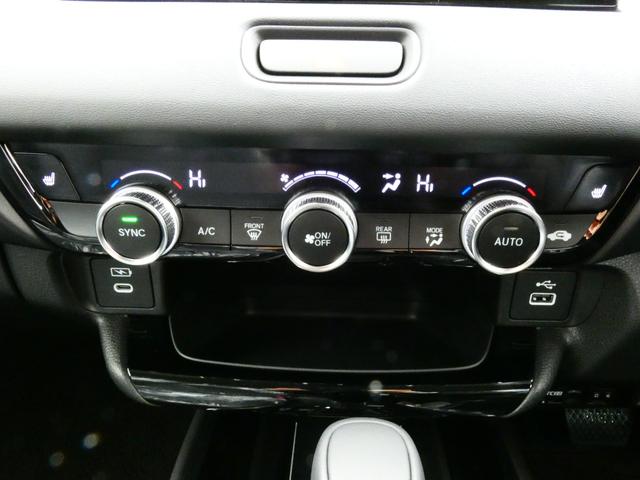 ヴェゼル ｅ：ＨＥＶ　Ｚ　登録済未使用車　９型ナビ　３６０°カメラ　ＥＴＣ２．０　後退出庫サポート　ＣＭＢＳ　ＡＣＣ　ＢＳＩ　アダプティブドライビングビーム　ＬＫＡＳ　ステアリングヒーター　ハンズフリーパワーバックドア（6枚目）